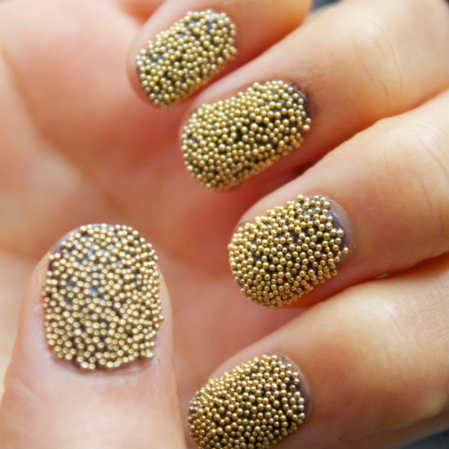 Caviar manicure gold
